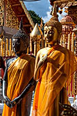 Chiang Mai - Wat Phra That Doi Suthep. The innercourtyard of the temple is filled with Buddha statues and other religious paraphenalia. 